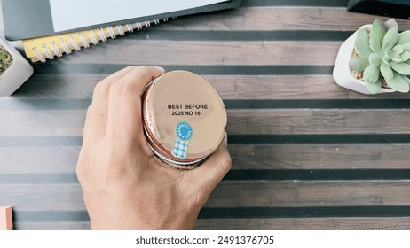 Close up text best before date on bottle cap food