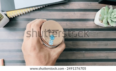 Close up text best before date on bottle cap food
