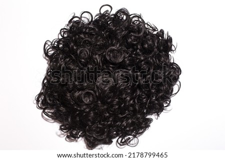 The close up of the texture of the afro curly hair isolated on the white background