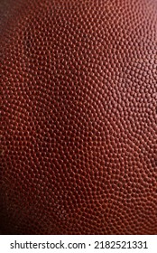 Close Up Texture Of An Old Weathered Pigskin Football.