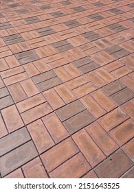 Close Up Textured Red Brick Walkway.