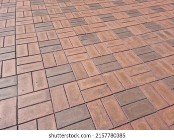 Close Up Textured Red Brick Walkway.