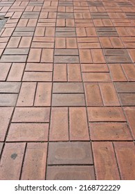 Close Up Textured Red Brick Walkway.