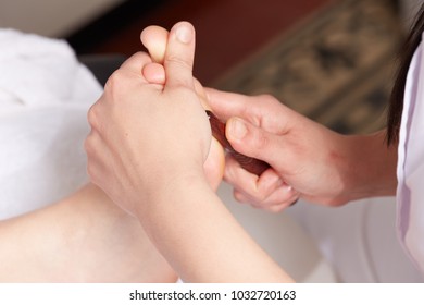 close up of thai foot massage - Shutterstock ID 1032720163