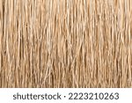 Close up of thatch roof or wall background. Tropical roofing on beach. High quality photo