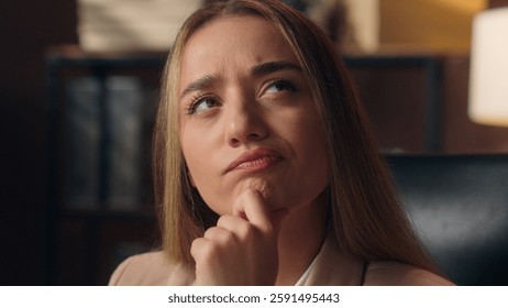 Close up thoughtful doubtful pensive Caucasian business woman female girl businesswoman worker CEO secretary manager thinking puzzled solving problem solution brainstorm plan indoors office apartment