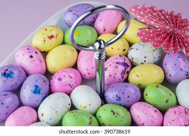 Close Up Of Tiered Server Tray With  Chocolate Easter Candy Eggs.