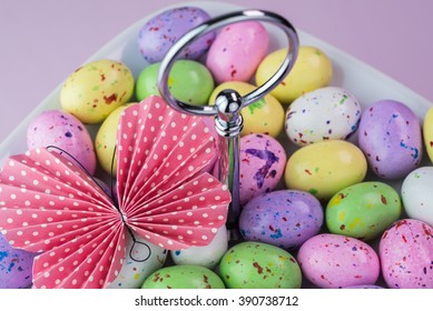 Close Up Of Tiered Server Tray With  Chocolate Easter Candy Eggs.