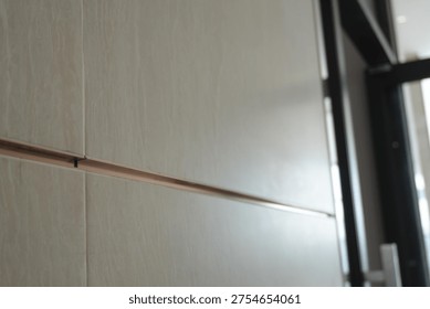 A close up of a tile wall in construction site.