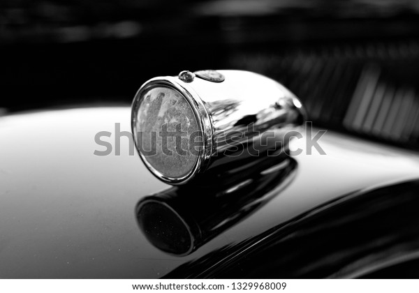 A close up of a\
tiny cute car headlight