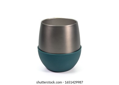 The Close Up Of Titanium Gray Tumbler Cup And Green Silicone Rubber On White Background.