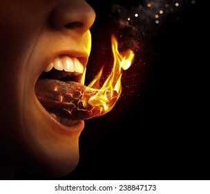 Close up of a tongue that is on fire.