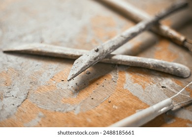 Close up Tools for forming clay on background , Shallow Depth of Field - Powered by Shutterstock