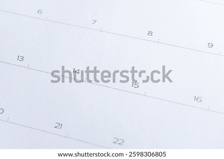Close up top down shot of a blank calendar on the date of 15th with dashed border or dotted line border. Event, Taxation, Taxes due, submission, filing deadline, extension concept