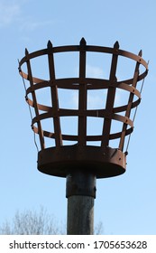 Close Up Top Of A Fire Beacon Against Blue Sky