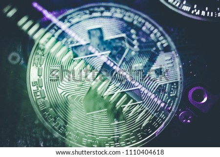 Close up of top important cryptocurrencies which dollar bank note in background. which including of Bitcoin, Ethereum, Litecoin, Dash, Zcash and Ripple coin. Business and financial of cryptocurrency.