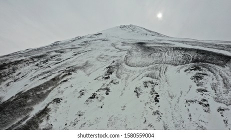 Close Up Top Of Mount Fuji Covered With Snow From Drone