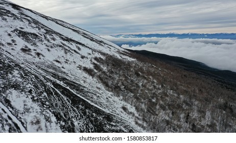 Close Up Top Of Mount Fuji Covered With Snow From Drone