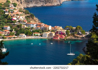Close up top view at Asos village, Assos peninsula and fantastic blue Ionian Sea water. Aerial view, summer scenery of famous and extremely popular travel destination in Cephalonia, Greece, Europe