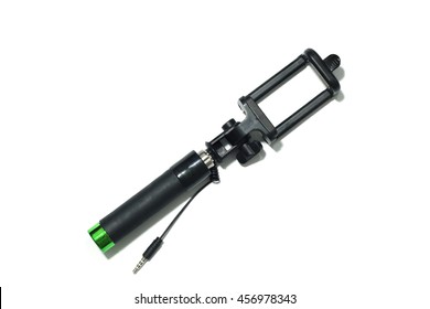 Close Up Top View An Extensible Selfie Stick With An Adjustable Clamp On The End Isolated On White Background