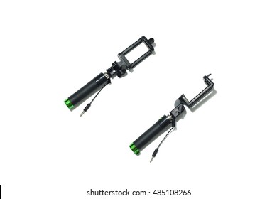 Close Up Top View An Extensible Selfie Stick With An Adjustable Clamp On The End Isolated On White Background