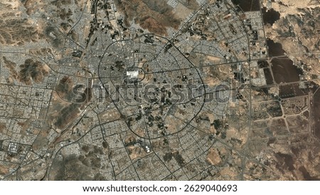 Close top view satellite map of Al Madinah city showing detailed urban layout, streets, and landmarks in Saudi Arabia’s historic city.