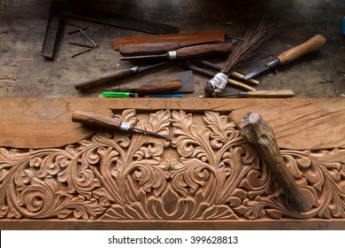 Close up top view set of carpenters tool on the hand made engraving, carving wood - Powered by Shutterstock