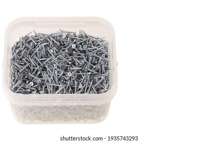 Close Up  Top View Set Of Screws For Gypsum Wallboard In Plastic Box Isolated On White Background. Industrial Equipment Concept.