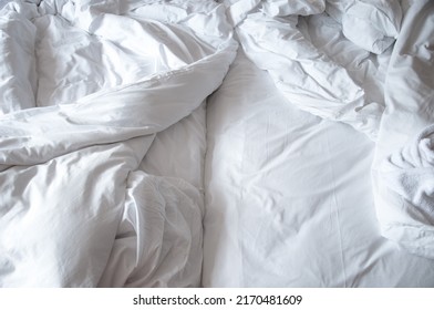 Close Up Top View Of White Wrinkle Messy Blanket On Bed In Bedroom, From Sleeping In A Long Night, Duvet , Morning Time On Bed