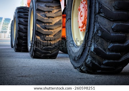 Close up of tractor tire, selective focus. 
