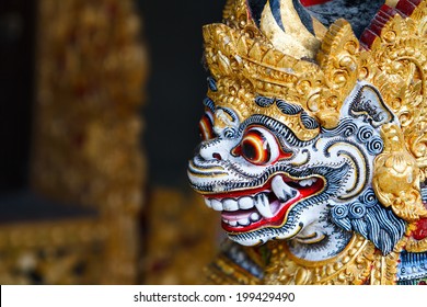 Close up of a traditional Balinese God statue in Bali temple
