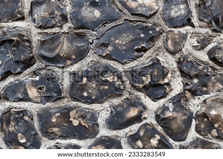 Close up of a traditional knapped chalk flint wall
