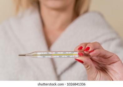 Close Up Traditional Thermometer For Measuring Body Temperature In Hand