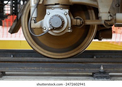 Close up train wheel on track at the station - Powered by Shutterstock