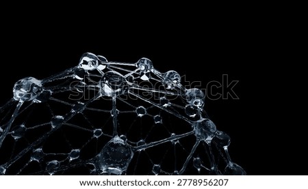 A close up of transparent molecular structure against black background, showcasing intricate connections