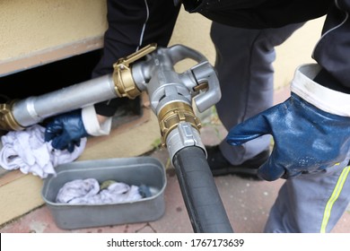 Close Up Of A Truck Delivering Straight Heating Oil