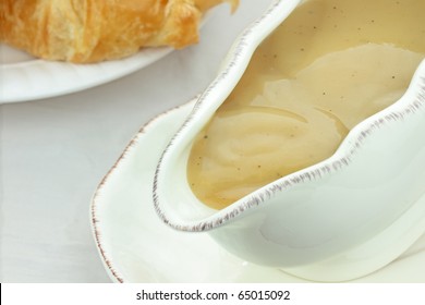 Close Up Of Turkey Gravy In A Gravy Boat.