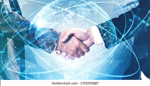 Close up of two businessmen shaking hands in city with double exposure of blurry network interface and planet hologram. Concept of internet and partnership. Toned image