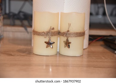 A Close Up Of Two Christmas LED Decorative Candle Lights.