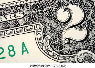 A close of a two dollars text.