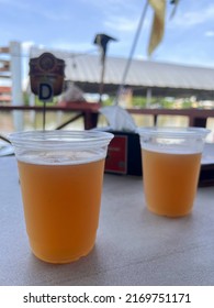 Close Up Two Glasses Of Craft Beer At Riverside Bar For Celebration