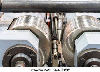 Close up two thread rolling die of automatic hydraulic horizontal thread rolling machine for manufacturing in industrial - Powered by Shutterstock