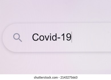 Close Up Of Typing COVID-19 Into Search Bar On Computer Monitor. Virus Or Pandemic Concept. How To, Internet Tips. Pixel Art. Typing The Word COVID 19 In The Browser On Pixelated Computer Screen.