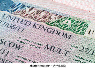 Close up United Kingdom visa in passport - Shutterstock ID 149400863