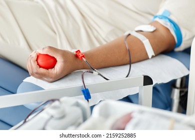 Close Up Of Unrecognizable Black Woman Giving Blood While Laying In Chair At Blood Donation Center, Copy Space