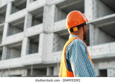 Close Up Of Unrecognizable Man Foreman In Workwear On Construction Site