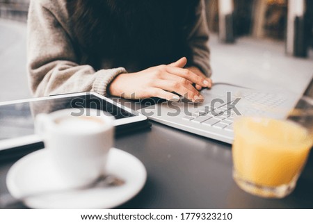 Close up unrecognizable woman using computer - Middle section caucasian female using laptop - business, working, freelance concept