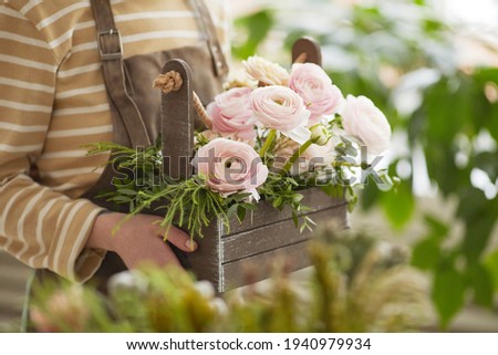Similar – Image, Stock Photo Unrecognizable young woman crafting with paper and scissors