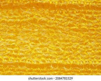 close up, background, texture, large horizontal banner. heterogeneous surface structure bright saturated yellow sponge for washing dishes, kitchen, bath. full depth of field. high resolution photo - Shutterstock ID 2084781529