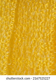 close up, background, texture, large vertical banner. heterogeneous surface structure bright saturated yellow sponge for washing dishes, kitchen, bath. full depth of field. high resolution photo - Shutterstock ID 2167525227